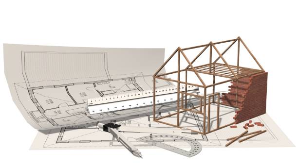 istock House project - house under construction on blueprint - project for construction industry 821768794