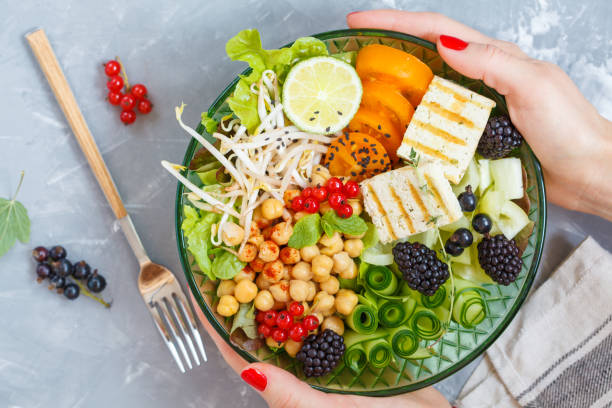 istock buddha bowl of vegetables, chickpeas and tofu. 821768920