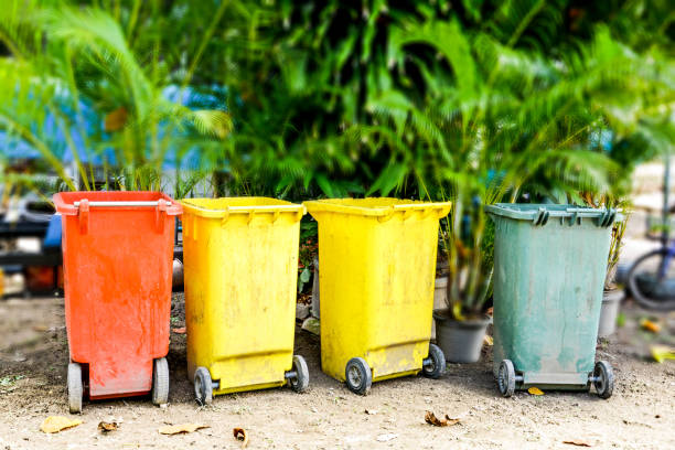 istock High plastic garbage bin in Thailand color red yellow blue street 821769030