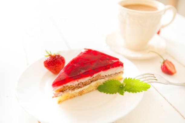 istock Strawberry tart on plate on white wooden table 821779530