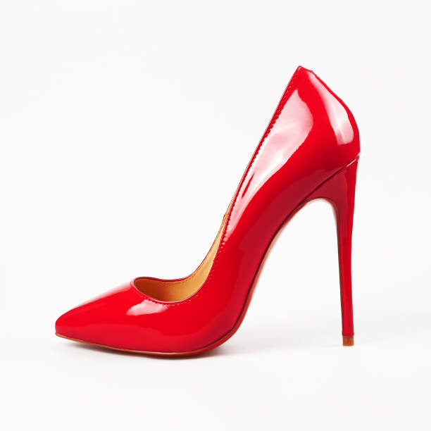 female red high-heeled shoes over white female red high-heeled shoes over white high heels stock pictures, royalty-free photos & images
