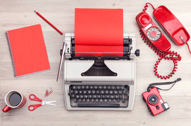 istock White and red typewriter and office supplies 821783530