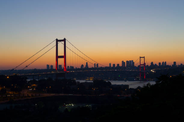istock Martyrs Bridge ( 15 Temmuz Sehitler Koprusu ) Bosphorus Bridge at night Istanbul, Turkey 821787436