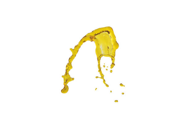 istock flying beautiful oil splah isolated over white background and drops 821791636
