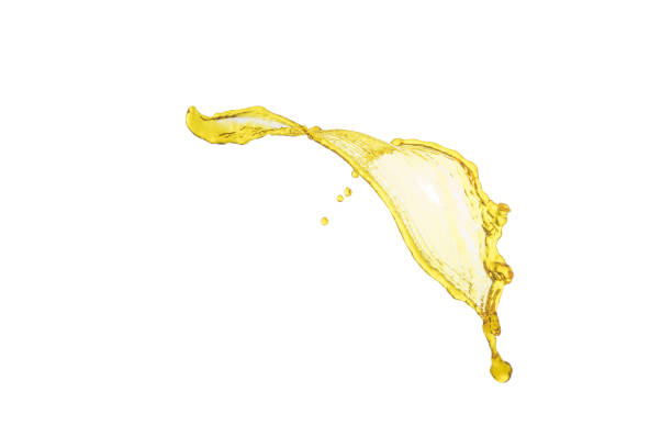 istock flying beautiful oil splah isolated over white background and drops 821791714