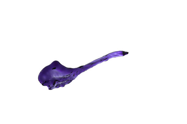 flying beautiful purple splash and drops isolated over white background