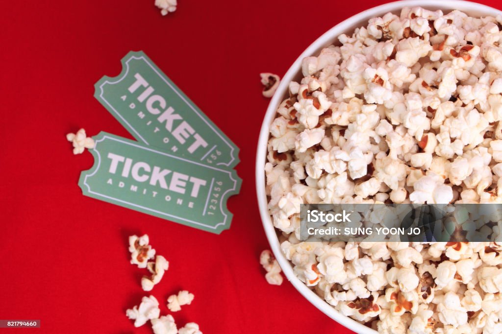Top view of popcorn and movie tickets Movie Ticket Stock Photo