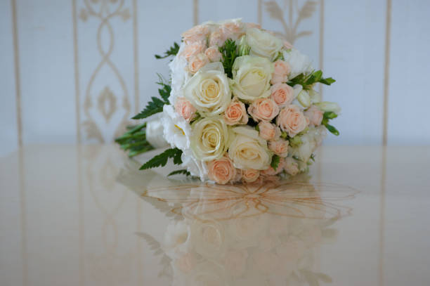 istock Wedding bouquet with white and pink roses 821795496