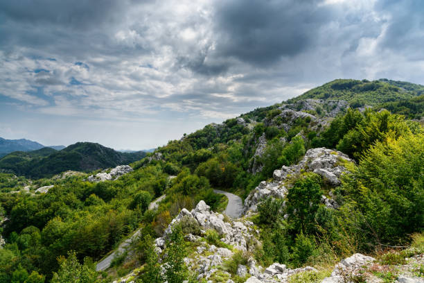 istock Mountain landscape and road in summer 821798990