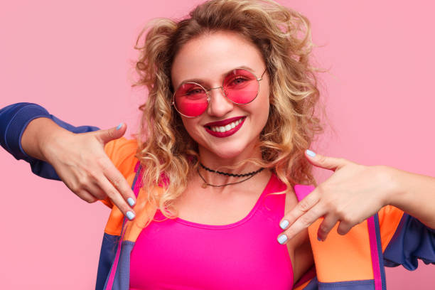 istock Trendy colorful girl posing confidently 821804312