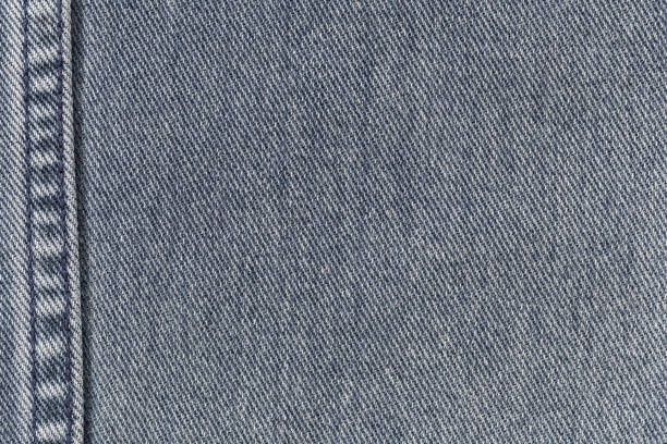 istock Fabric pattern seam texture of denim or blue jeans for the design abstract background. 821811480