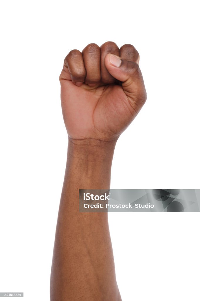 Male black fist isolated on white background Male black fist isolated on white background. African american clenched hand, gesturing up. Counting, aggression, brave, masculinity concept Fist Stock Photo