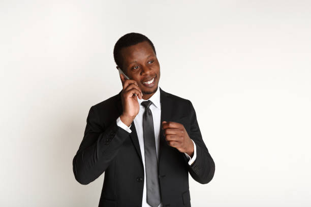 istock Cheerful businessman talking on mobile phone 821814986