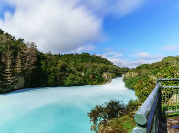 Photo of The Huka falls are the largest , fast and powerful waterfalls on the Waikato River , located in Wairakei Park of Taupo , North Island of New Zealand