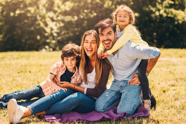 istock Young family in the park 821819828