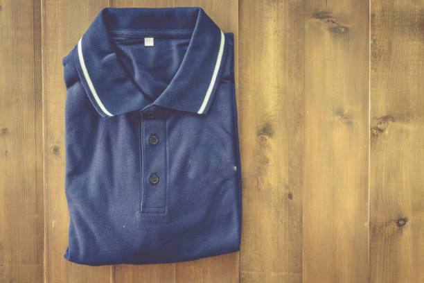 istock Blue shirt on the wooden table 821820326