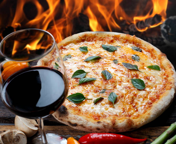 Pizza with glass of red wine