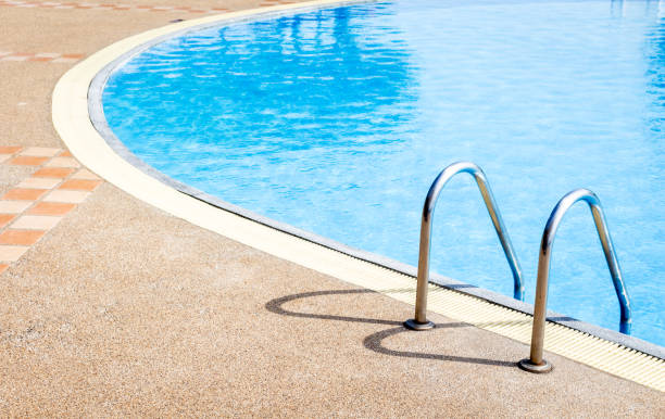 istock Hotel swimming pool with stair 821820572