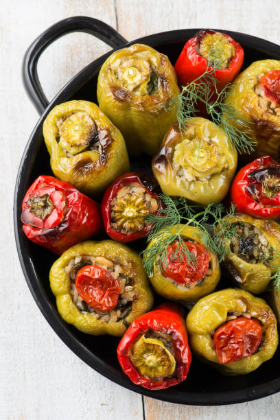 Stuffed green and red peppers Stuffed green and red peppers stuffed pepper stock pictures, royalty-free photos & images