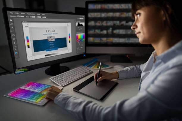 graphic designer at work. color samples. - graphic designer imagens e fotografias de stock