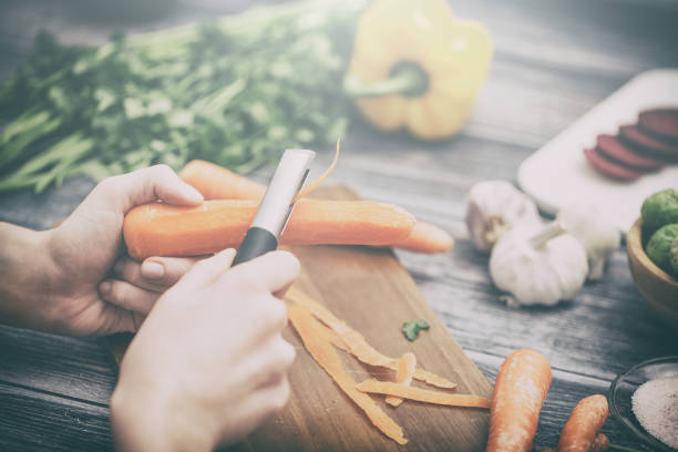 istock Slicing, chopping and peeling the vegetables cook. 821824572