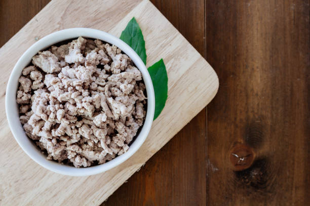 istock Minced meat on wooden table 821825088