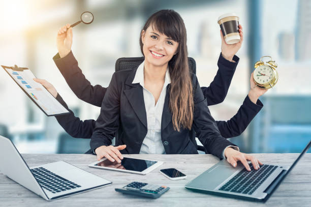 Multitask business woman with many hands. Multitask business woman with many hands. Performing several actions at the same time. versatility stock pictures, royalty-free photos & images