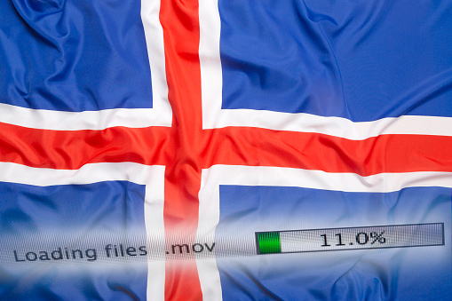Downloading files on a computer with Iceland flag