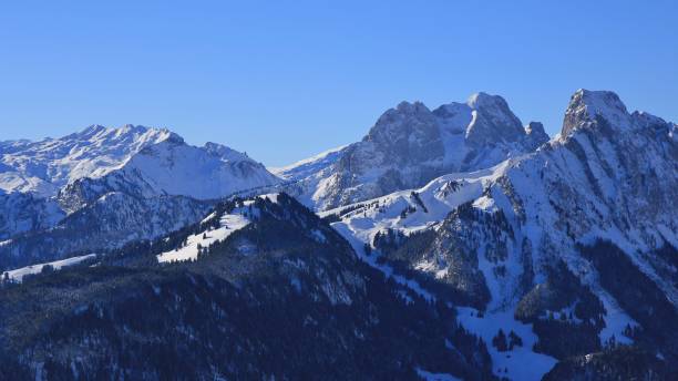 istock Snow covered mountains Gummfluh and Le Rubli, view from mount Rellerli. 821836790