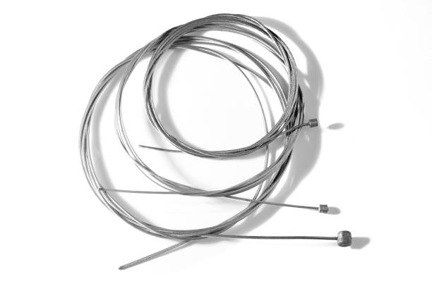 istock Bicycle brake and transmission wire or steel cable isolated on white 821837334