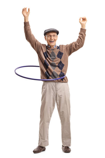 istock Cheerful senior with a hula hoop 821840166