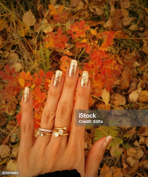 Autumn Golden Manicure Gold Glitter Nails Stock Photo - Download Image Now - Autumn, Fingernail, Arts Culture and Entertainment