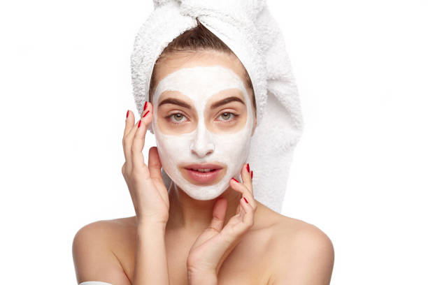 istock Woman with cleansing mask 821848468