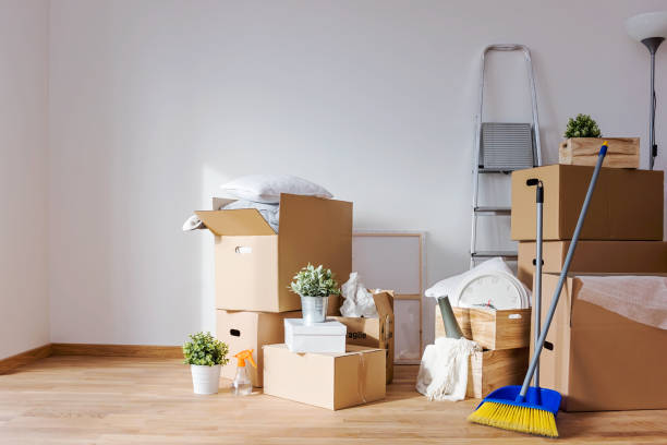 istock Move. Cardboard boxes and cleaning things for moving into a new home 821848870