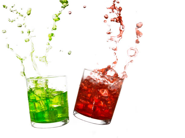 istock Glasses of olourful cold drinks with water splash and ice cubes. 821851958