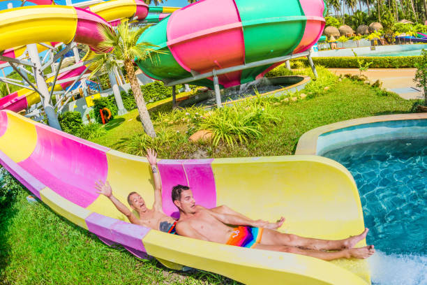 istock Homosexual couple - men - having fun in waterpark 821852692