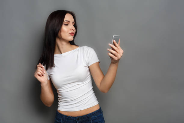 istock Woman taking photo with gadget, communication 821859526