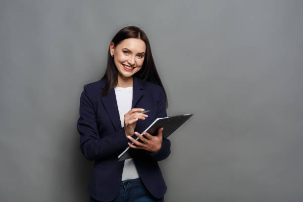 istock Business woman checking schedule at work 821859766