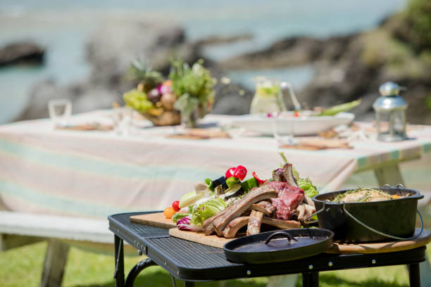 istock Young people having fun on the beach at BBQ. 821860164
