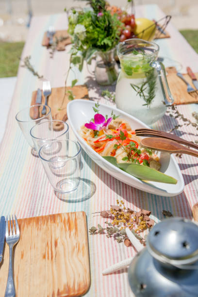 istock Young people having fun on the beach at BBQ. 821860192