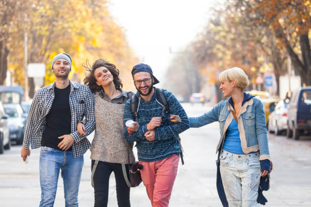 istock Friends holding hands and hanging out 821860322