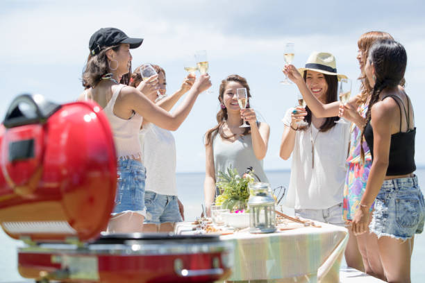 istock Young women are having fun at the BBQ 821861106