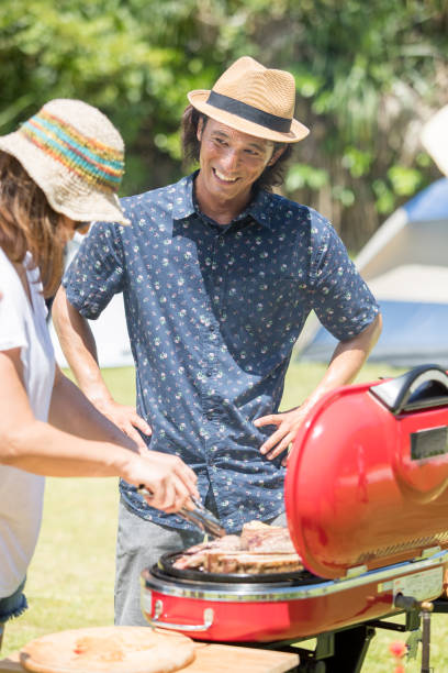 istock Young women are having fun at the BBQ 821861478