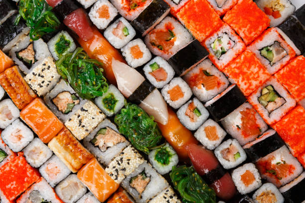 istock Set of sushi, maki and rolls background 821862380
