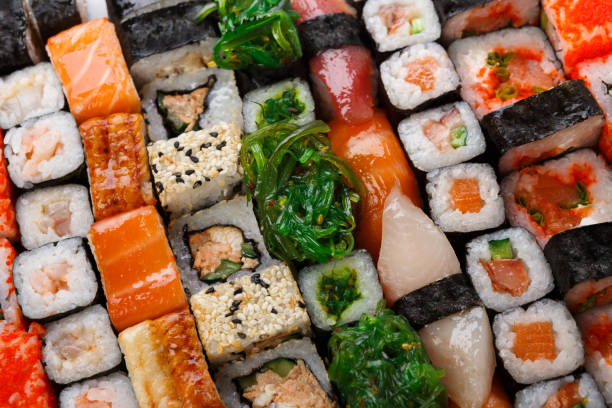istock Set of sushi, maki and rolls background 821862814