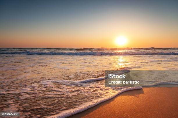 Colorful Ocean Beach Sunrise Stock Photo - Download Image Now - Beach, Sunrise - Dawn, Virginia Beach