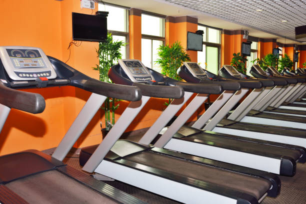 istock Treadmill equipment in a gym 821868920