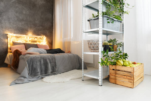 istock Woman lying on bed in apartment 821872164