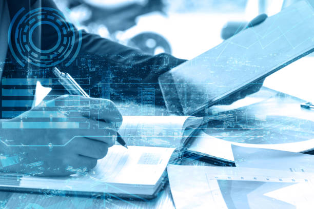 istock double exposure businessman writes business plan with tablet 821872304