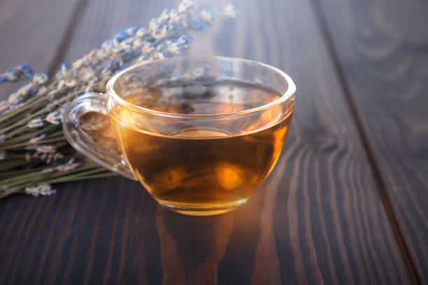 istock Cup of lavender tea and lavender flowers. 821881208